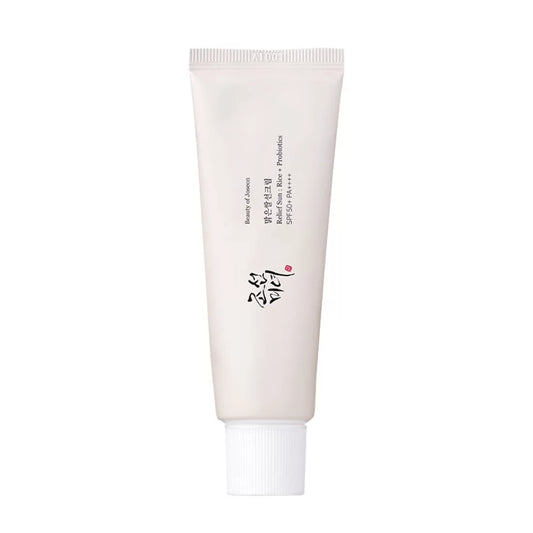 A tube of 'Beauty of Joseon Relief Sun' sunscreen with SPF50+ PA++++ protection, featuring rice and grain fermented extracts. The packaging is in a light beige tone with Korean text and a heart symbol.